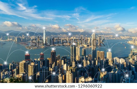 Digital network connection lines of Hong Kong Downtown. Financial district and business centers in smart city in technology concept. Skyscraper and high-rise buildings. Aerial view