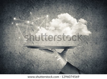 Cropped image of waitress's hand in white glove presenting cloud with social media network structure on metal tray. Gray wall on background. 3D rendering.