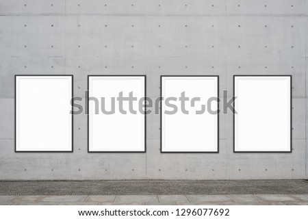 row of framed poster / blank poster frames near sidewalk mock up for advertising