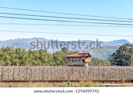 An historic blockhouse from the Anglo Boer War, in a vineyard, at the railway bridge over the Breede River at Wolseley in the Western Cape Province Royalty-Free Stock Photo #1296099742