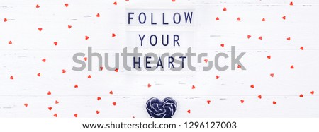Creative Valentine Day romantic composition flat lay top view love holiday celebration black heart lightbox white wooden background copy space Template greeting card text design social media blogs