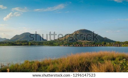 View of Ban Thai Niyom Reservoir, Na Wang District, Nong Bua Lam Phu Royalty-Free Stock Photo #1296147523