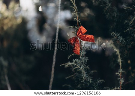 Bow on the tree. New year and Merry Christmas decorations. Happy holidays. Selective focus