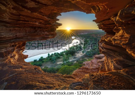 sunrise at natures window in the desert of kalbarri national park, western australia Royalty-Free Stock Photo #1296173650