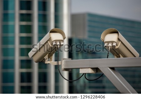 security camera and urban video (cctv) on building