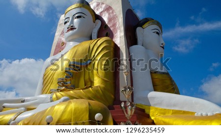 Kyaikpun pagada,Four giant buddha statues Landmark Of Bago in Bago, Myanmar  Royalty-Free Stock Photo #1296235459