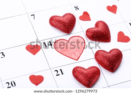 Valentine day calendar with red hearts