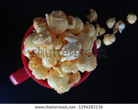 Caramelized Popcorn in Red Cup Close up