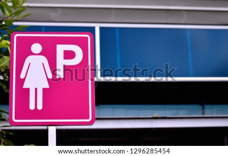 Lady Parking sign at gas station, special parking space for Lady