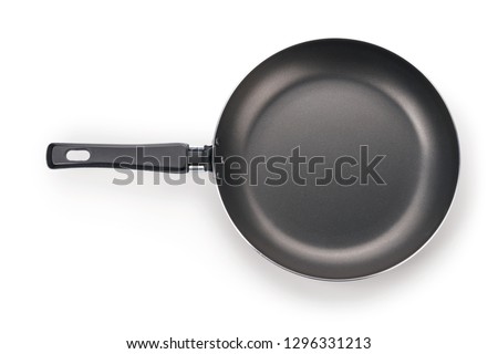 Black frying pan top view. Isolated on white, clipping path included Royalty-Free Stock Photo #1296331213