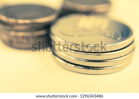 Stack of coins macro. Rows of coins for finance and banking concept. Economy trends background for business idea.