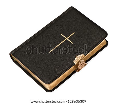 old black bible book with golden cross isolated on white background
