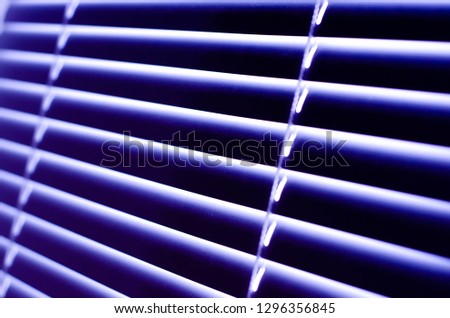 
closed blinds of blue color