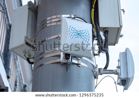 5G cellular repeaters on the pole Royalty-Free Stock Photo #1296375235