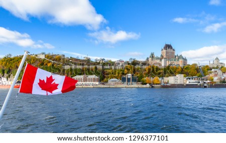 Panoramic autumn view of Old Quebec City waterfront and Upper Town from Saint-Lawrence River in Quebec, Canada Royalty-Free Stock Photo #1296377101