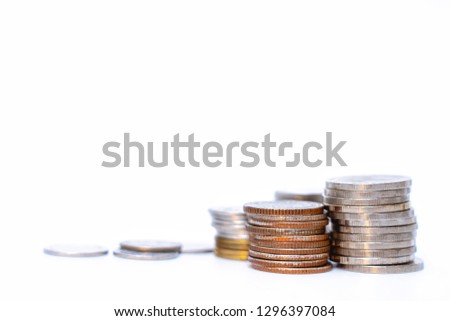 Coin stacks on white background.Saving, Investment money concept.Coin stack growing business and future.
