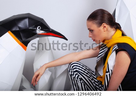 Beautiful female with low poly penguin