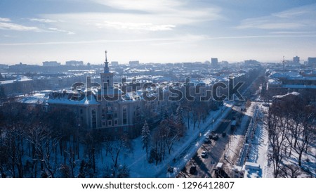 Winter Kharkiv city from the Sky. The famous Building with a spire near Gorky Central Park.