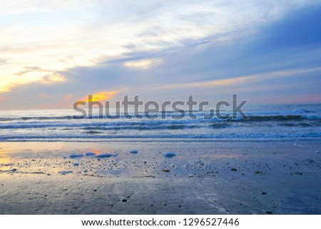 Beautiful colorful sunset over the beach and sea. Beautiful sky twilight time and reflection on the sea. peaceful moment. San Elijo State Beach, Encinitas, San Diego, California. 01/07/2019
