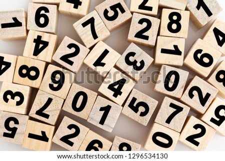 wooden blocks with numbers on white background.