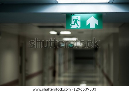 Fire exit sign in the hospital