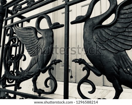 Metal decorations in the form of ducks for a balcony