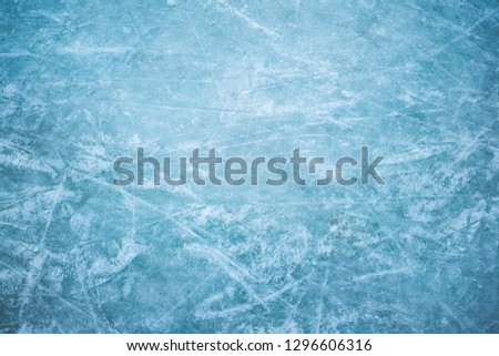 Blue ice in skate scratches, close up view