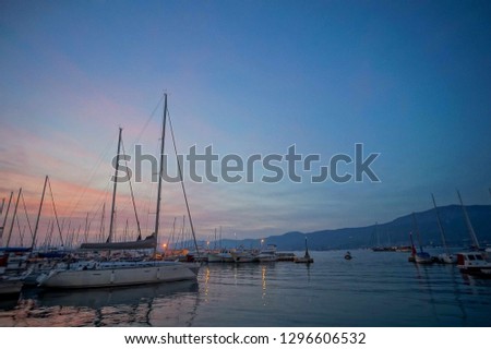 sailing boats at sunset, digital photo picture as a background