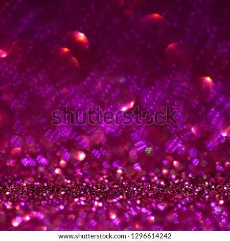 crimson and Purple glitter magic background. Defocused light and free focused place for your design. Abstract background