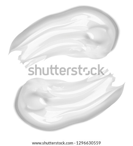 close up of  a white cream sample on white background