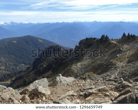 A panoramic view of North Cascades from a top of Sauk Mountain in Washington