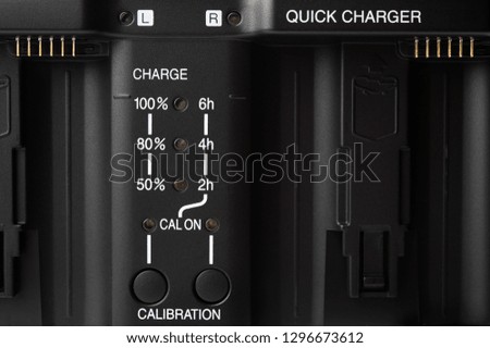 Quick charger for camera batteries.