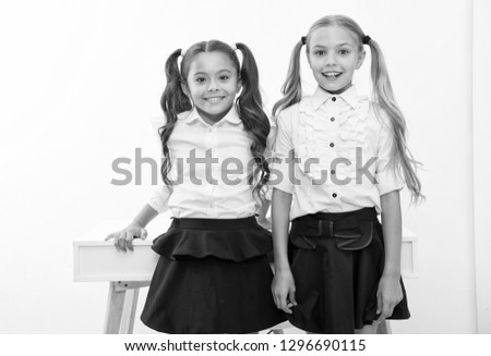 Example to follow. Schoolgirls with cute pony tails hairstyle. Best friends excellent pupils. Perfect schoolgirls with tidy fancy hair. School hairstyles ultimate top list. School fashion and style.