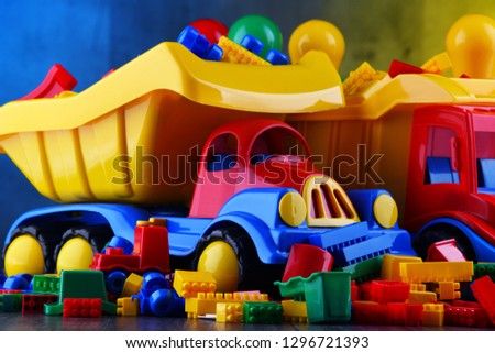 Composition with colorful plastic children toys.