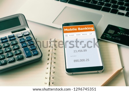 Mobile Banking Network. People use smartphones to check their online payment account.