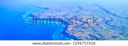 View of the east coast of Miyakojima seen from an airplane Royalty-Free Stock Photo #1296755926