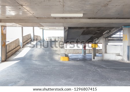 Driveway up and down way in parking garage in hospital.