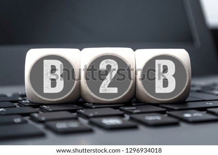 B2B Business Cubes on laptop keyboard 