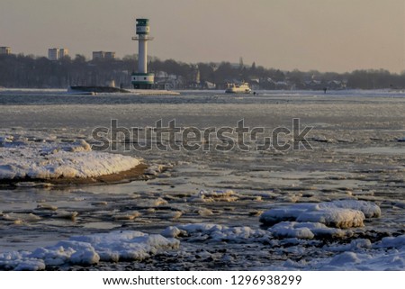 wonderful winter seascape with view to the frozen Kiel Fjord