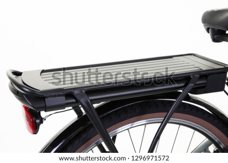 Close-up of rechargeable lithium battery for electric bike isolated on white background