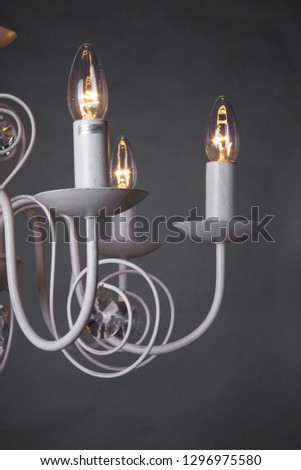 Chandelier isolated on black background Royalty-Free Stock Photo #1296975580
