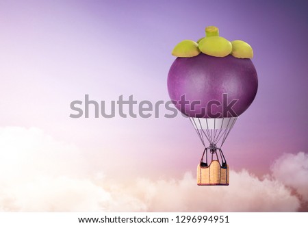 3D mangosteen hot air  balloon floating in the sky; Air travel and aircraft,Tourism and recreation. Sky objects. Royalty-Free Stock Photo #1296994951