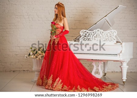 Vintage beautiful woman in veil red dress with yellow gold diadema with ruby stones, gorgeous style 