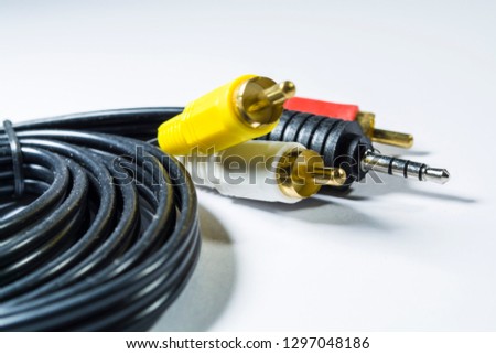 Hank of multi-colored plugs. Adapter. Tulips adapters for audiodevices. On a white background. The isolated object. 