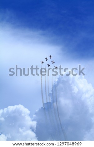 fighter planes doing acrobatics in the air