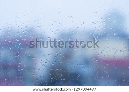 Water drops on window after rain, natural texture as background 
