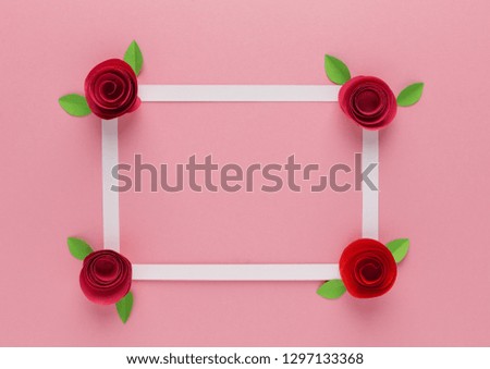 Background with white frame, roses of paper, decor, spring