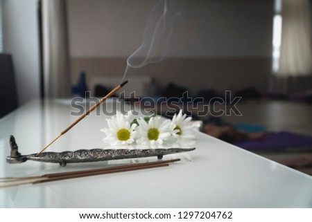indian smoky aroma sticks with flowers;