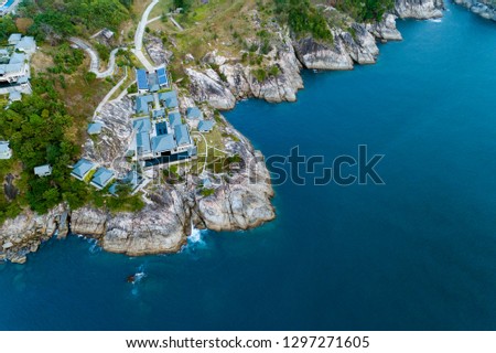 Aerial drone bird's eye view photo of Modern villa on mountain Seaside Resort.