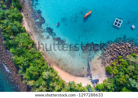 Aerial view blue sea white sand beach with coconut palm tree tropical island
